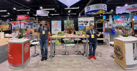 Image of trade show booth coordinated by Market Development Branch