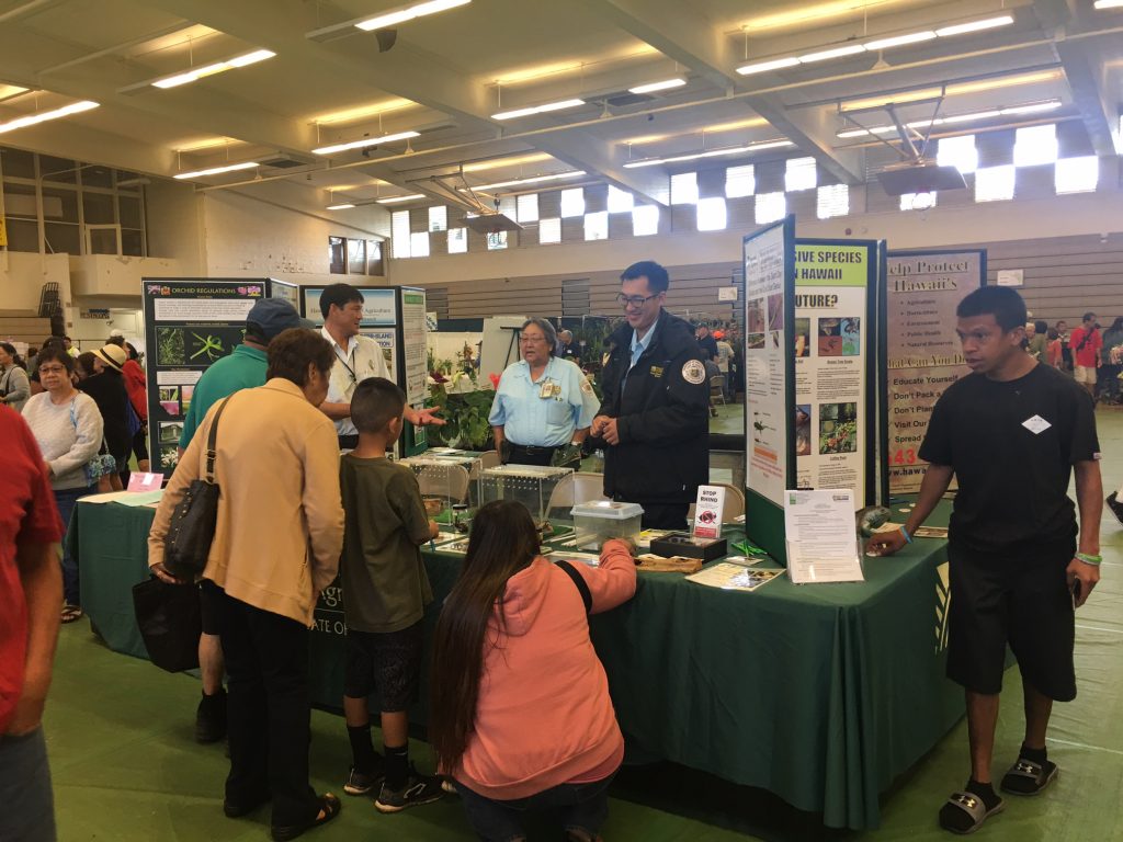 Informational booth by HDOA's Plant Quarantine Branch was a busy attraction at the Kunia Orchid Show in Wahiawa, Oahu in March 2018 pic 2