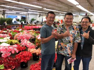 Deputy Glenn Muranaka (center) visits Green Point Nurseries with Thong Teng Neo (left) and Eric Tanouye (right)